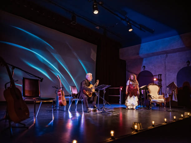 istock Mature Performer and Guitarist on the stage 1349266102