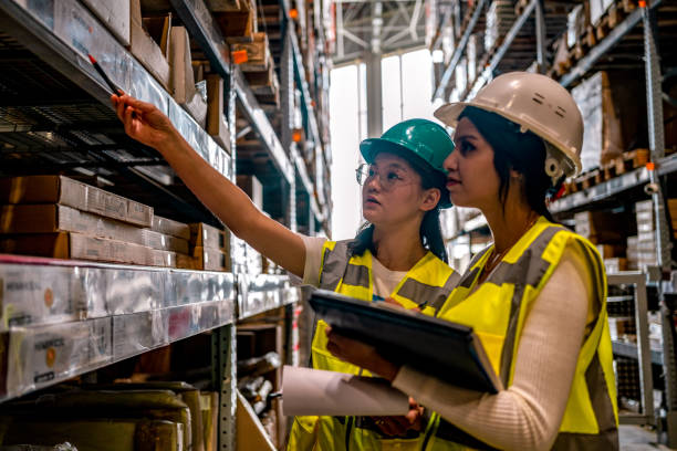 Warehouse worker checking stock levels