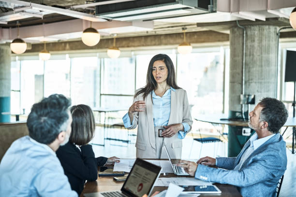 istock Corporate business professionals having meeting in office 1349269013