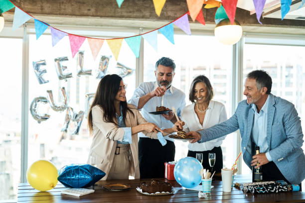 istock Colleagues eating cake at the office birthday party 1349269183