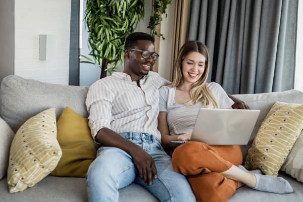 istock Portrait of a couple using laptop 1349269232