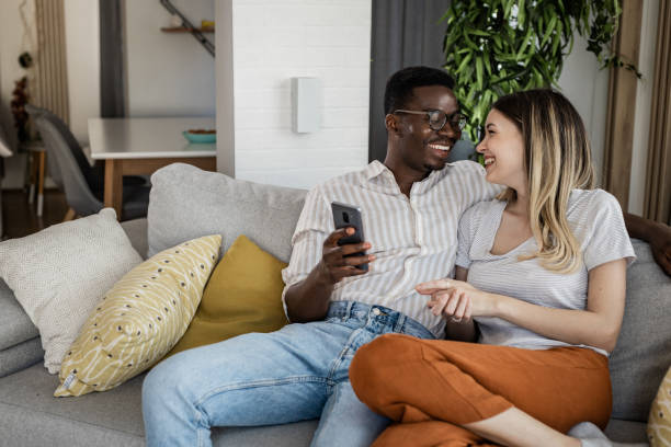 istock Portrait of a couple using smart phone 1349269238