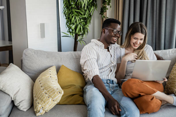 istock Portrait of a couple using laptop 1349269727