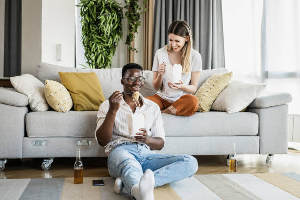 istock Couple relaxing at home on the weekend 1349269730