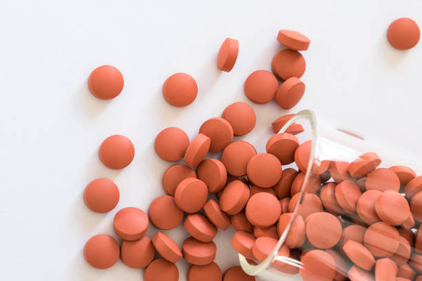 Ibuprofen Tablets Spilled from a Jar