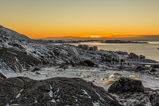 Beautiful Polar sunset, view from the hill to Nuuk fjord and new suburb of city, Greenland