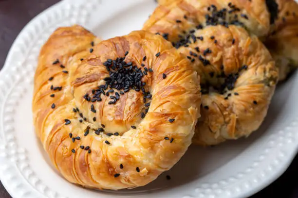 Traditional delicious Turkish phyllo stuffed with spinach, cheese (Turkish name; Gul borek or gul boregi) Rose shaped pastry.