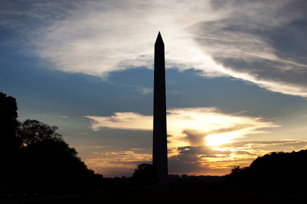 istock Washington Monument silhouetted against a dramatic sky 1349279126