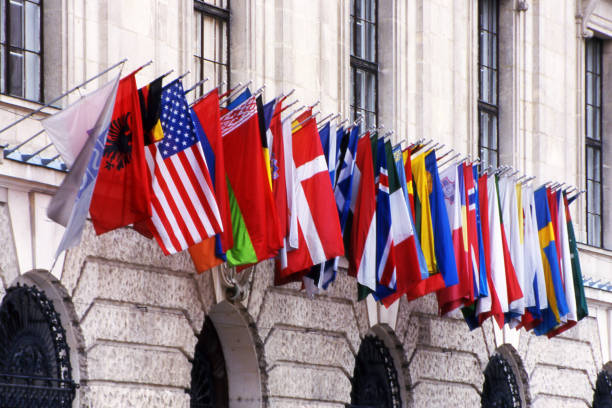 Flags of many nations on a building