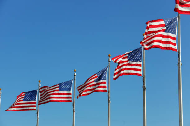 istock USA Flags at the Washington Monument blowing in the wind 1349279141