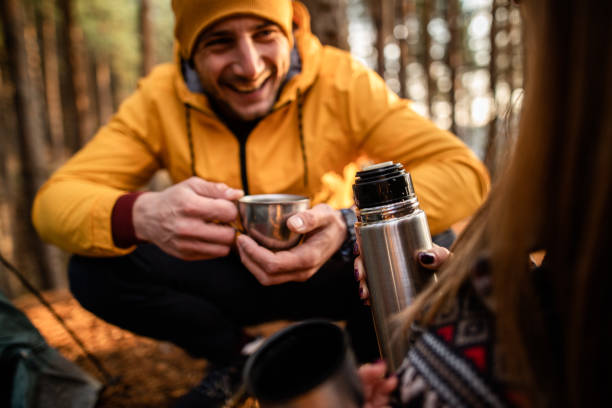 istock Young couple spending weekend together camping in nature 1349281825