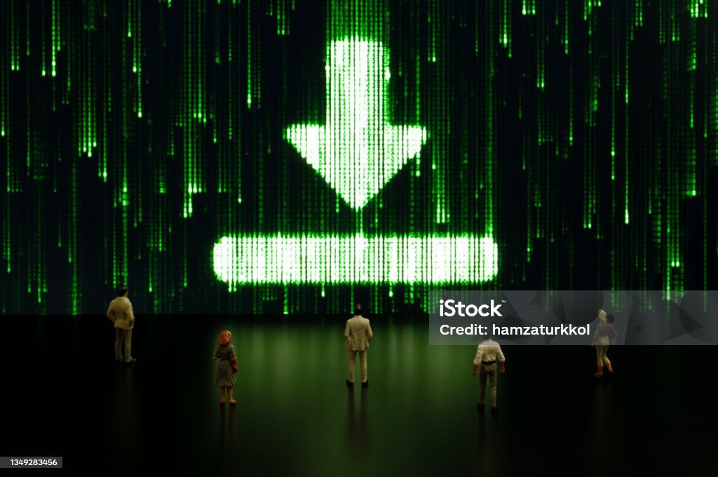 Matrix: Download Businessman/politician figurines examine a matrix style download symbol. Artificial intelligence/technology/digital age concept Computer Language Stock Photo