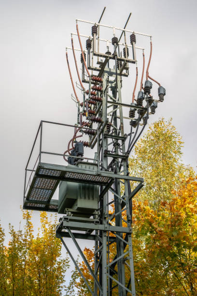 istock A transformer on a metal frame surrounded by trees in brightly colored autumn colors 1349284500