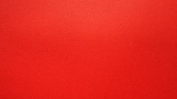istock Red simple Christmas background. Bright vivid kind of red. 1349287029