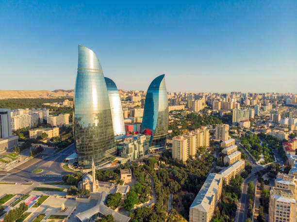 Baku, Azerbaijan City center and view of the Flame towers in summer time Baku Promenade And View At Flame Towers baku stock pictures, royalty-free photos & images