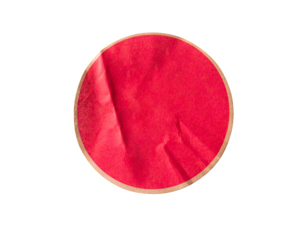 istock Blank red round adhesive paper sticker label isolated on white background 1349287548