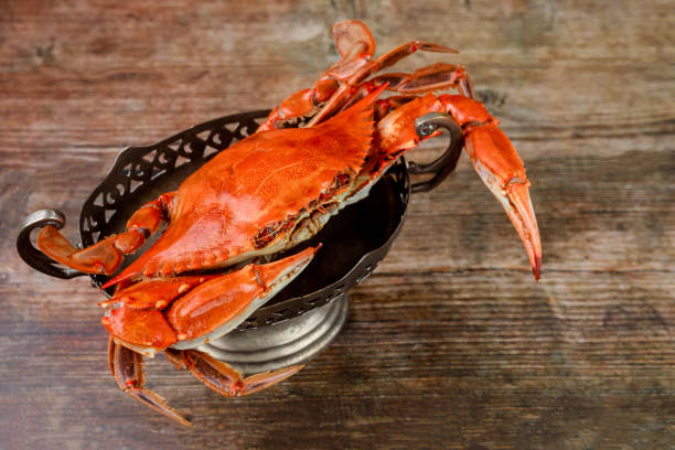 istock Cooked red crab on wooden background. Seafood. 1349302462