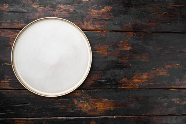 istock Empty dinner plate with copy space for text or food with copy space for text or food, top view flat lay , on old dark  wooden table background 1349314514