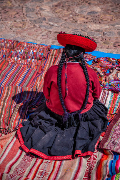 istock Peruvian woman selling souvenirs, The Sacred Valley, Peru 1349317556