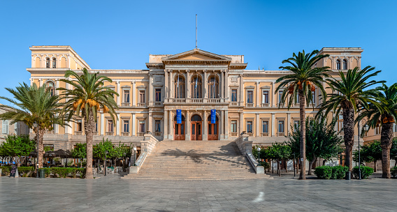 Hermoupolis, Greece - September 18 2021 - Panorama of the Town Hall on Miaouli square. Built in 1876, it is one of the largest and most impressive Town Halls in Greece.