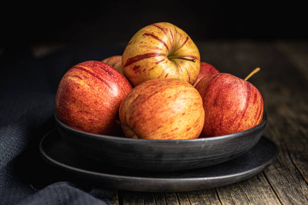 istock Fresh autumn apples on plate 1349322903