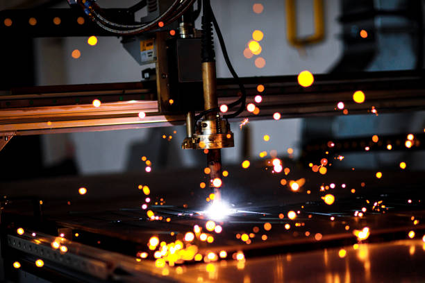 istock Industrial cnc plasma cutting metal plate. 1349323081