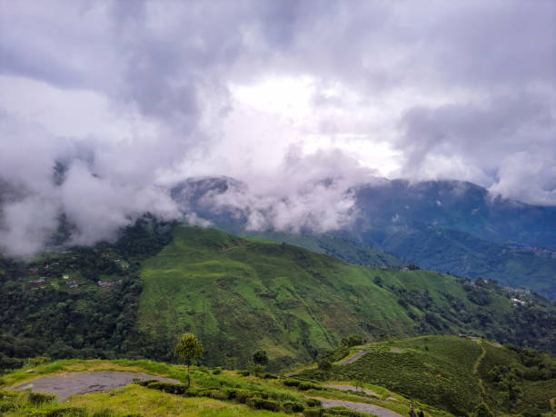 istock green mountain with dramatic sky at morning from hill top 1349324132