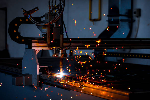 istock Industrial cnc plasma cutting metal plate. 1349329908