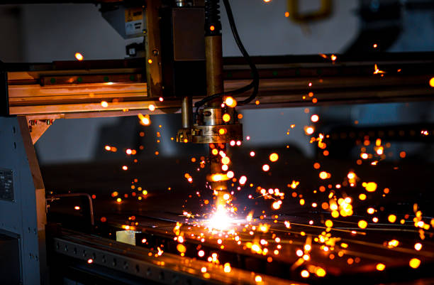 istock Industrial cnc plasma cutting metal plate. 1349329919