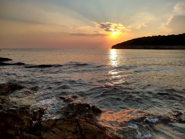 istock idyllic sunset in bay of Pula 1349330307