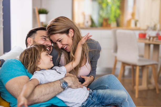 istock Young affectionate family enjoying in their time at home. 1349330352