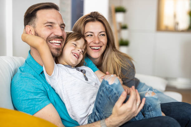 istock Young affectionate family enjoying in their time at home. 1349330958