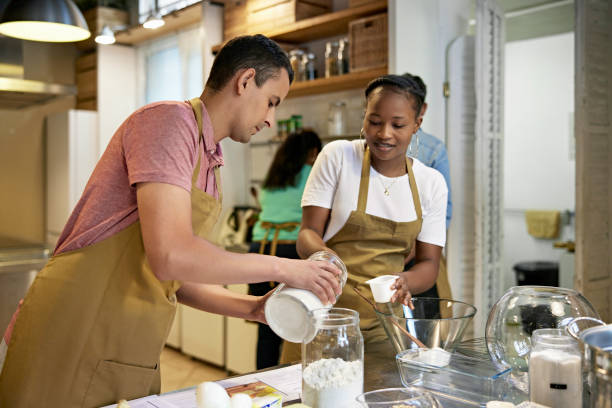 Adult Students Working Together in Cooking Class