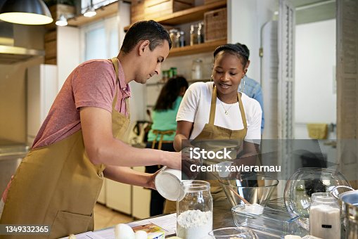 istock Adult Students Working Together in Cooking Class 1349332365