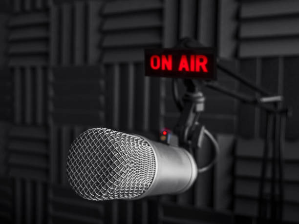 istock Professional microphone and on air sign 1349332975