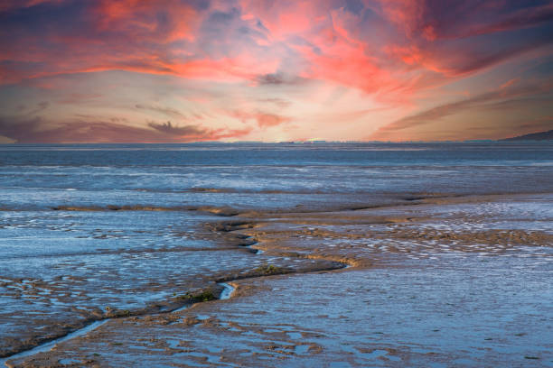 Dramatic sunset over the Wadden Sea of the North Sea in Butjadingen / Germany
