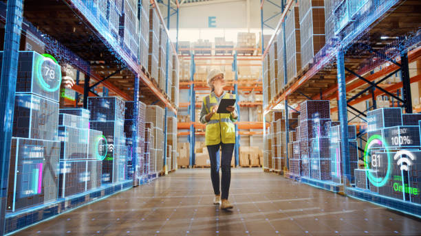 futuristic technology retail warehouse: worker doing inventory walks when digitalization process analyzes goods, cardboard boxes, products with delivery infographics in logistics, distribution center - shipping imagens e fotografias de stock