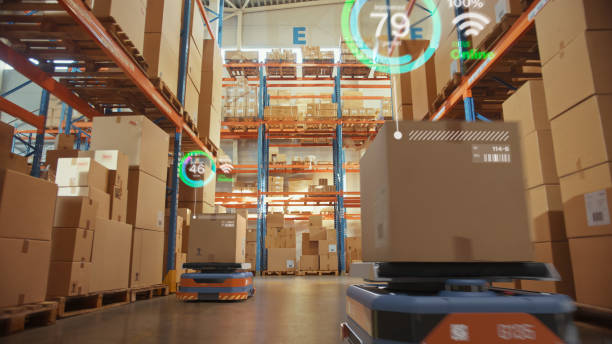 istock Future Technology 3D Concept: Automated Retail Warehouse AGV Robots with Infographics Delivering Cardboard Boxes in Distribution Logistics Center. Automated Guided Vehicles Goods, Products, Packages 1349338794