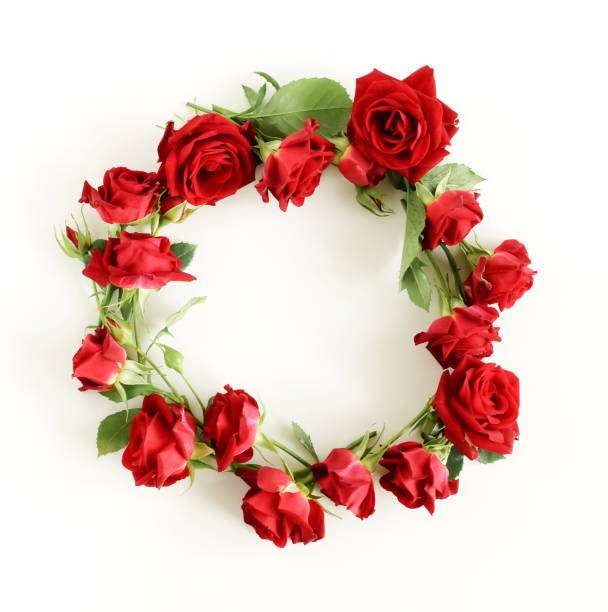 istock Red roses wreath isolated on white background top view with copy space. 1349339019