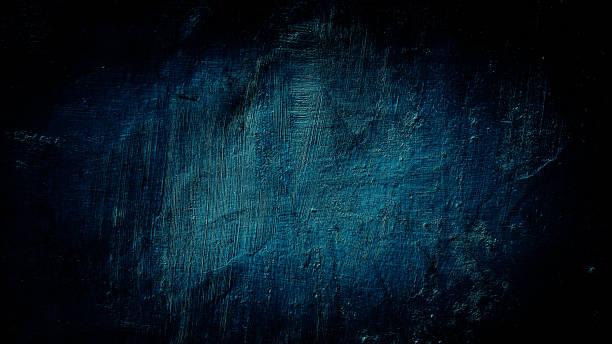 istock dark blue grunge background of old wall 1349339965