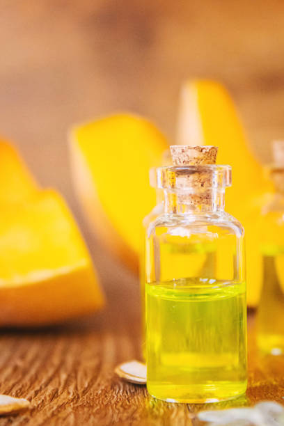 istock Pumpkin seed oil in a bottle. Selective focus. 1349340308