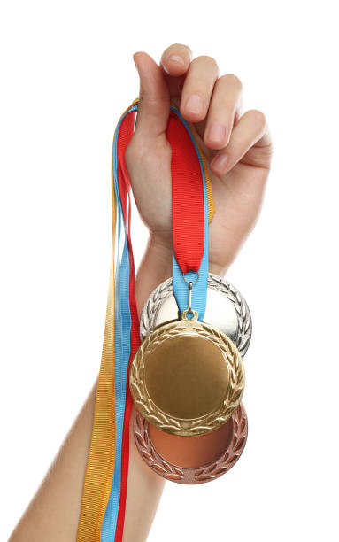 istock Woman holding medals on white background, closeup. Space for design 1349348090