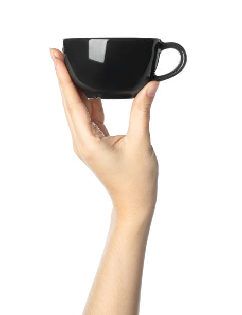 istock Woman holding black cup on white background, closeup 1349348473