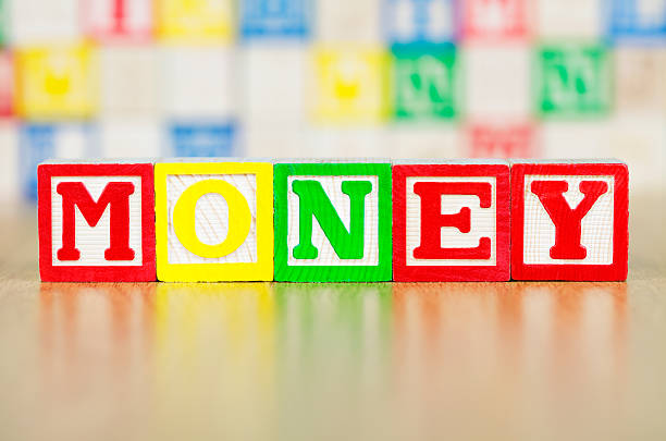 istock Money Spelled Out in Alphabet Building Blocks 134934896
