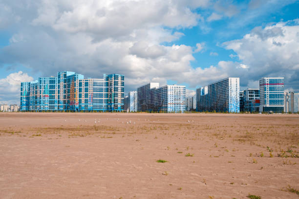 istock A multi-storey residential or business modern building with a rounded shape against the blue sky 1349351280