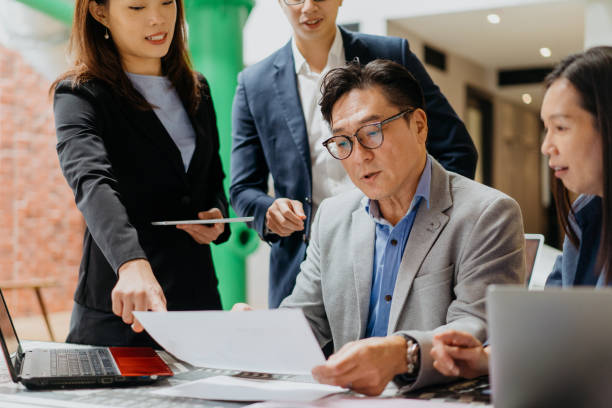 istock Business leader talking to his employees 1349351891