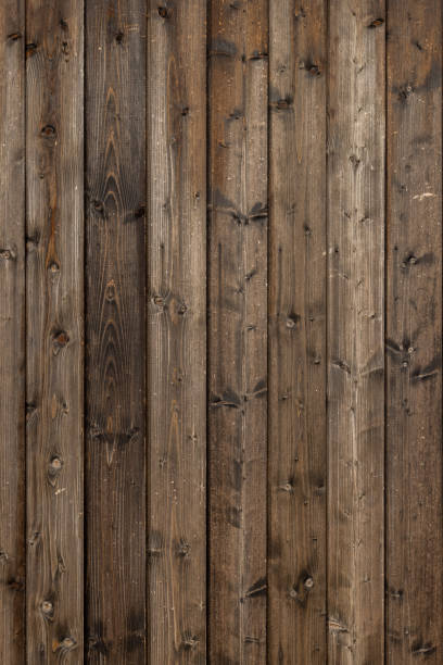 istock old dry weathered brownish gray wooden planks board surface - full frame background and texture 1349353487