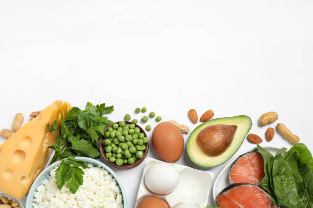 istock Different products rich in protein on white background, flat lay 1349354824