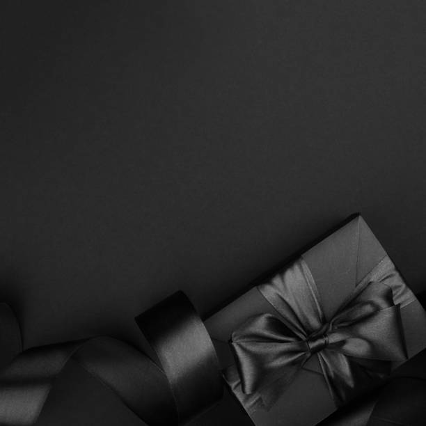 istock Black friday sale background with gift 1349354901