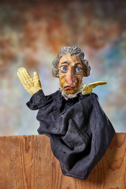 istock Vintage hand puppet from the 1930s, the gray haired senior man arguing 1349355182